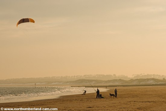 Fishing and Kite-Boarding on a cold winter day.